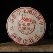 Шу Пуэр И Нань Мо Золотой Павлин верхняя почка старое дерево Гу И 2009 год 357 гр Тайваньское сырье